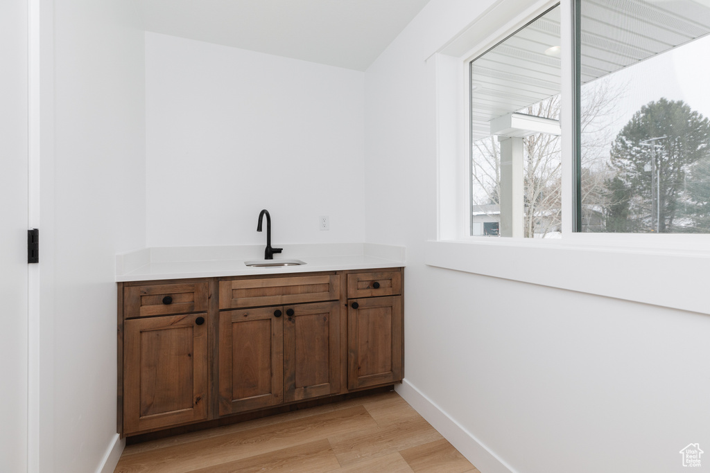 Bathroom featuring vanity and hardwood / wood-style flooring