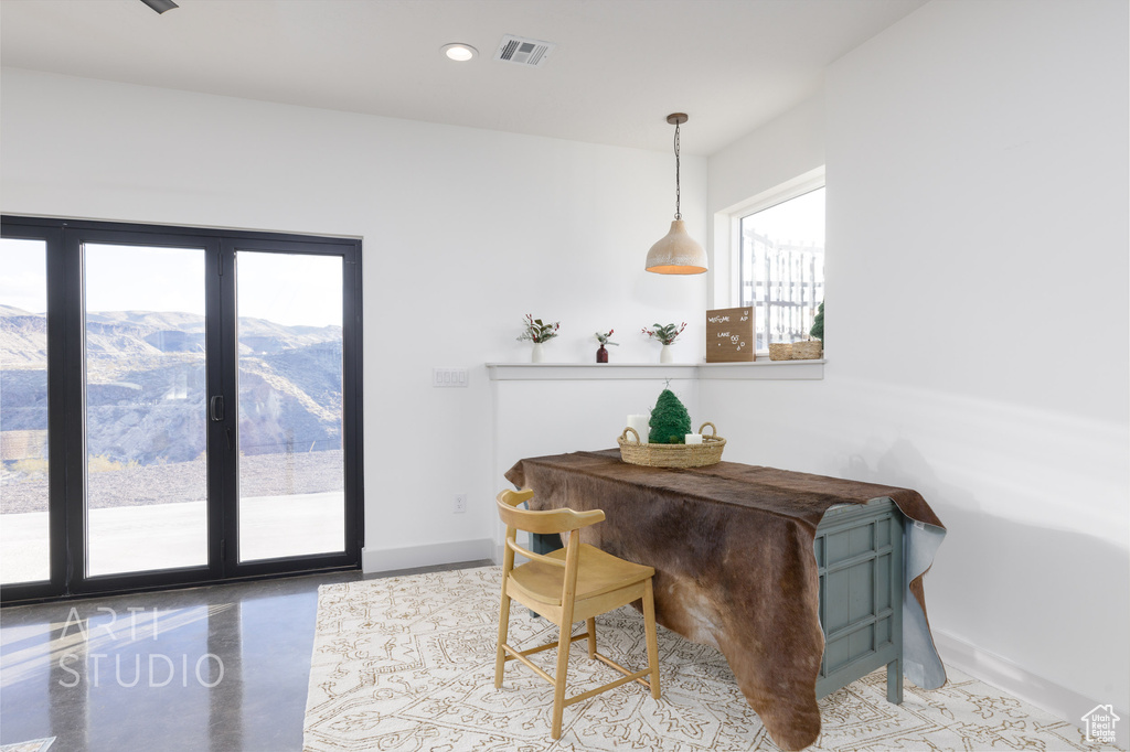 Dining room featuring a mountain view