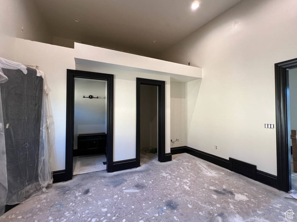 Unfurnished bedroom with connected bathroom
