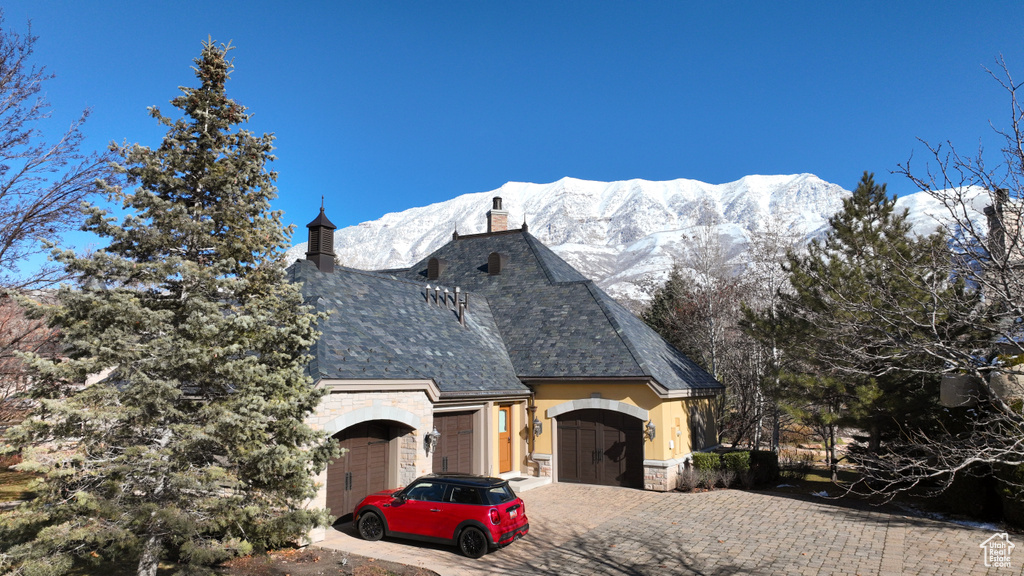 View of front of home with a mountain view