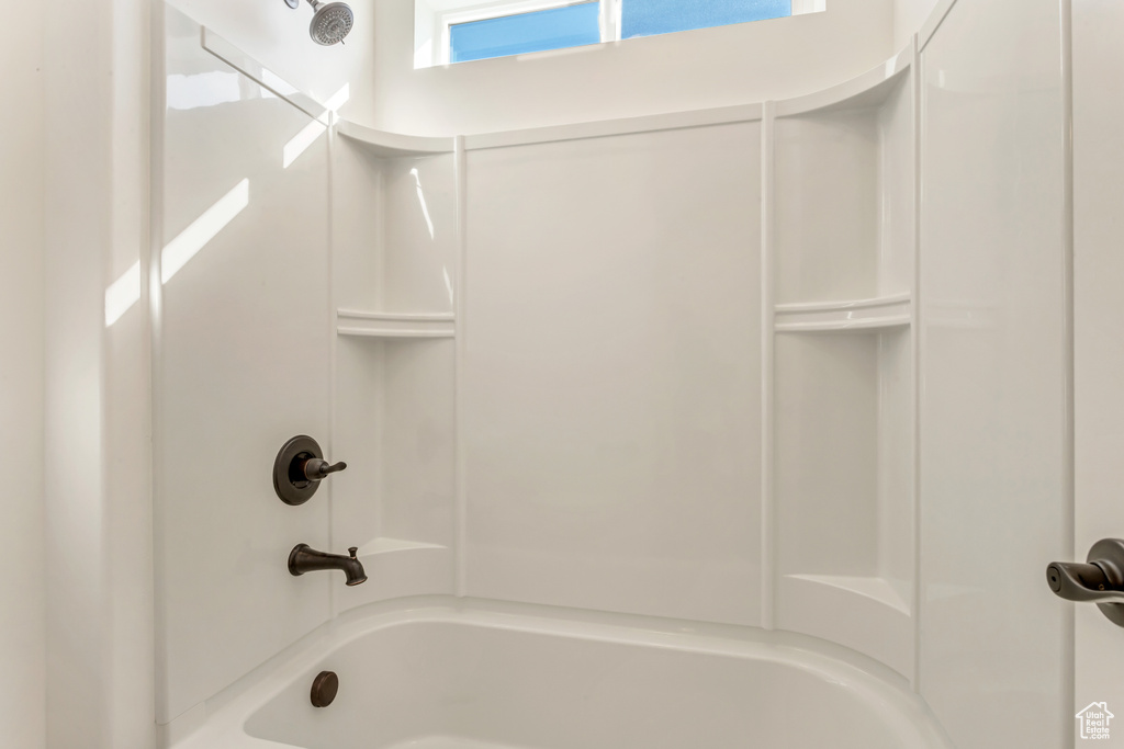 Bathroom with bathing tub / shower combination