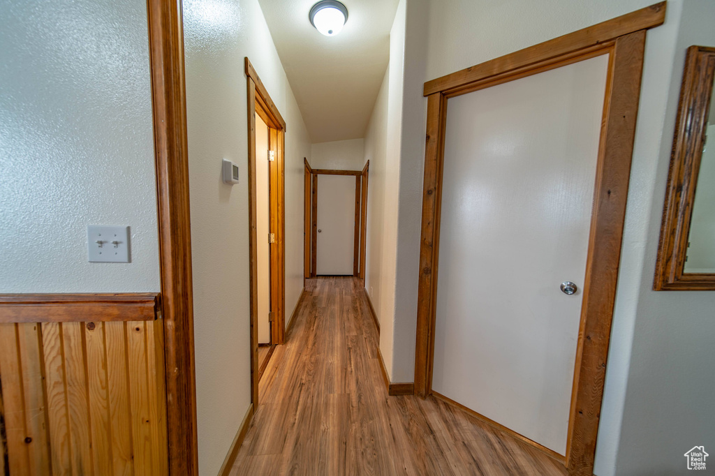 Hallway featuring light wood-type flooring