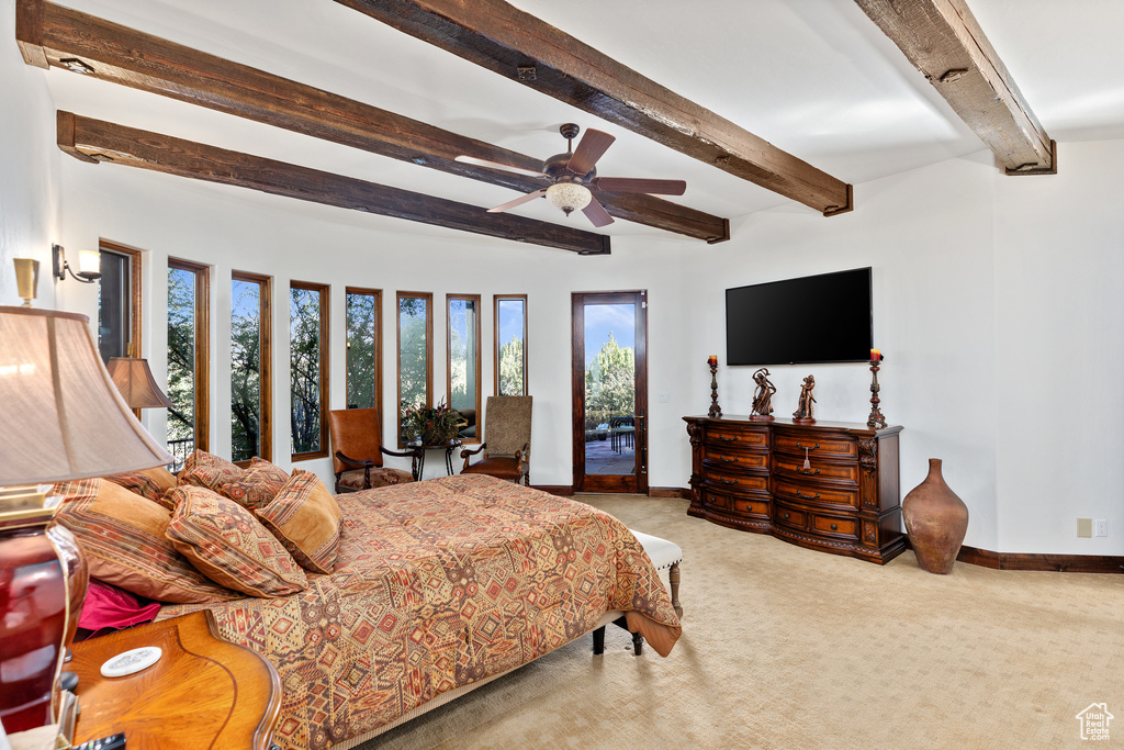 Bedroom with access to exterior, beam ceiling, ceiling fan, and light carpet