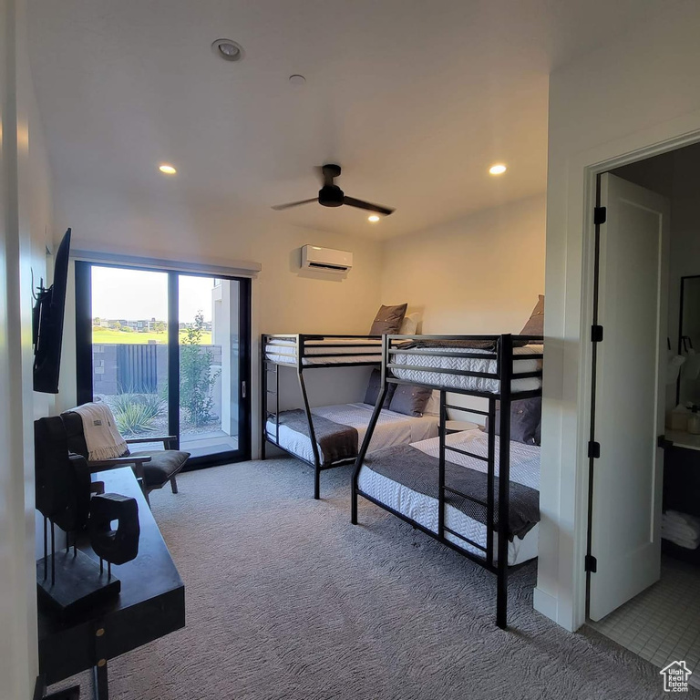 Bedroom with a wall mounted AC, ceiling fan, light colored carpet, and access to outside