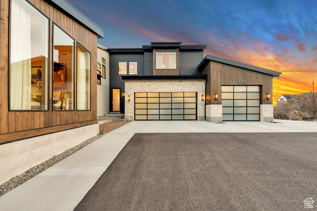 Contemporary home featuring a garage