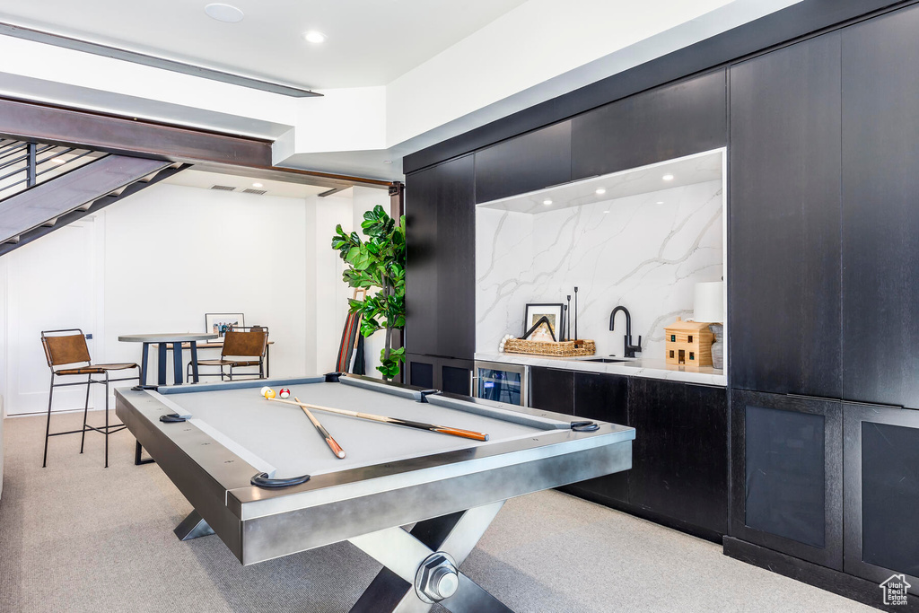 Game room with sink and billiards