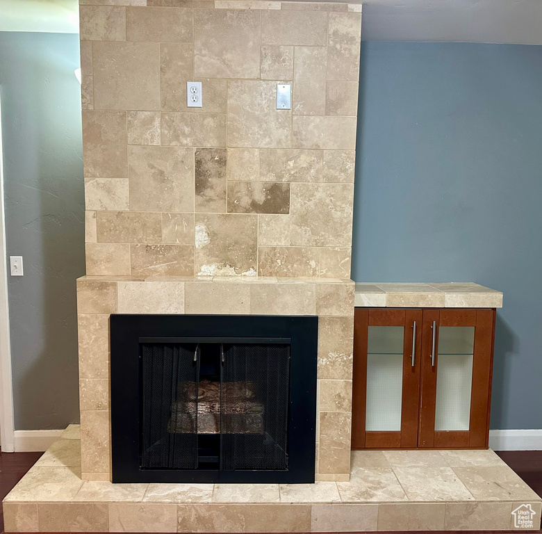 Interior details with a tile fireplace