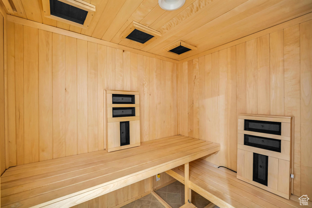 View of sauna featuring wooden ceiling