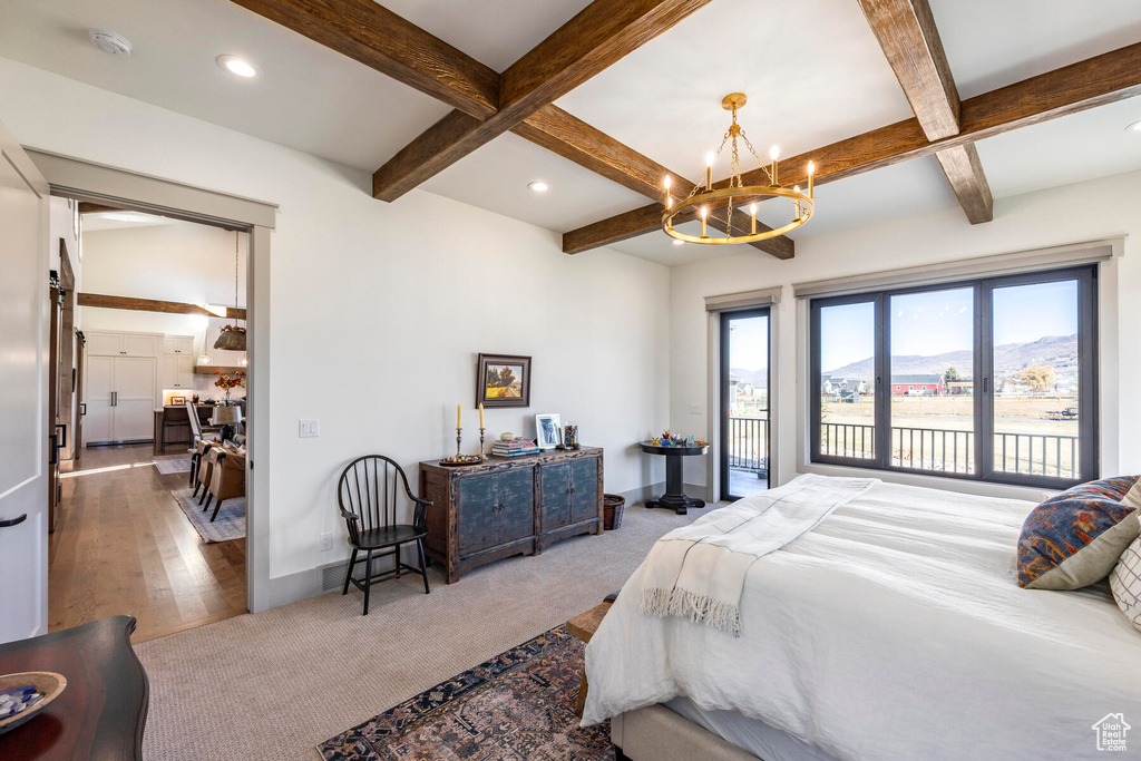 Bedroom featuring access to outside, a notable chandelier, coffered ceiling, light carpet, and beam ceiling