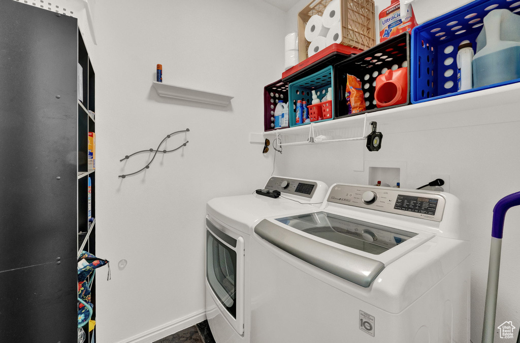 Laundry room with washer hookup and separate washer and dryer