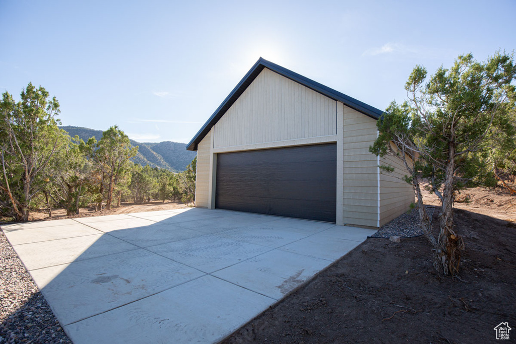 Garage featuring a mountain view
