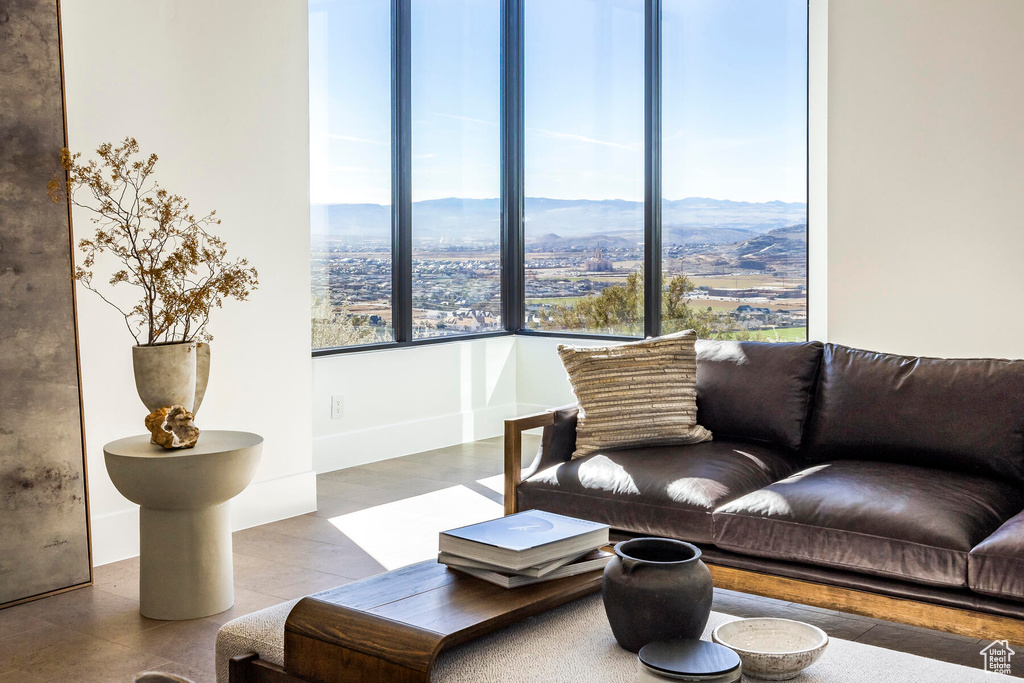 Tiled living room featuring a mountain view