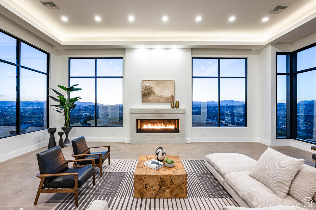 Living room with a mountain view and a premium fireplace