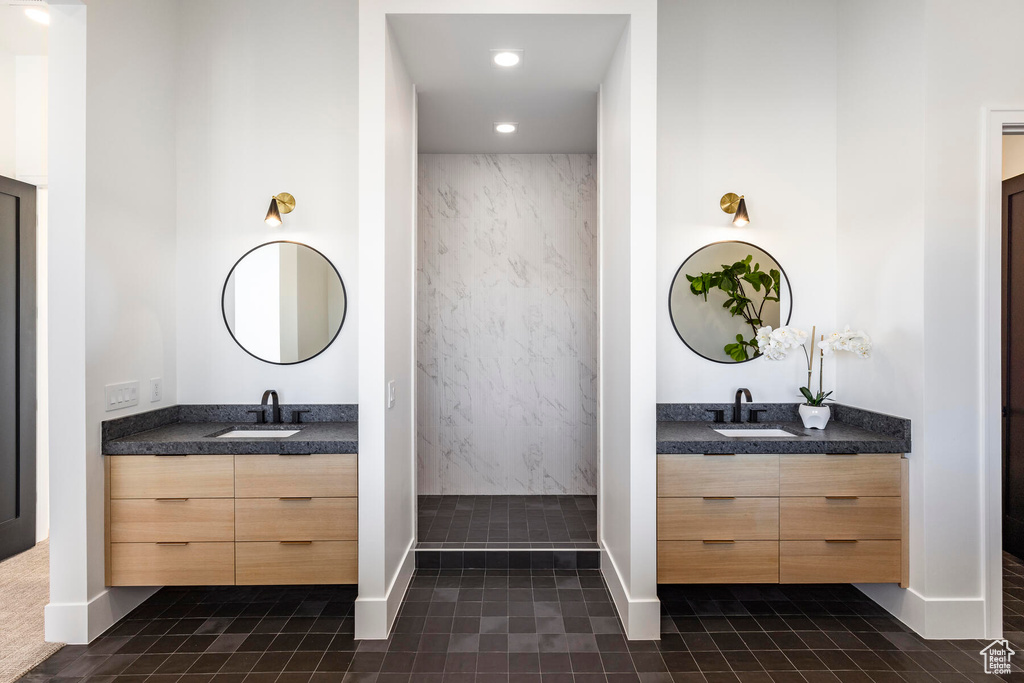 Bathroom with vanity and tile patterned floors