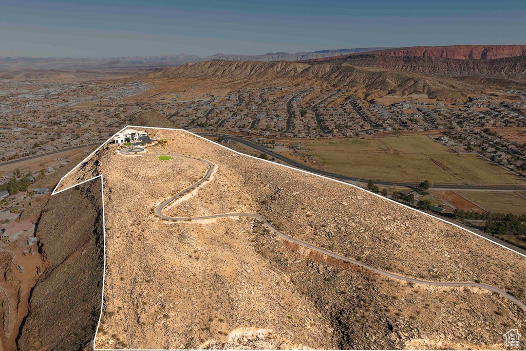 Birds eye view of property featuring a rural view