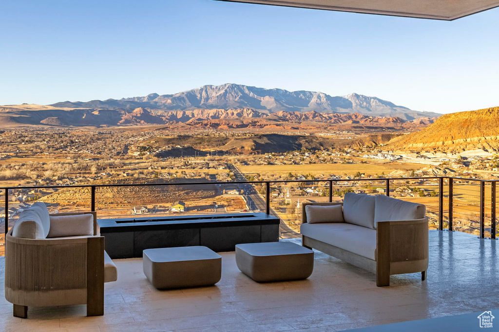 Exterior space featuring a mountain view and outdoor lounge area