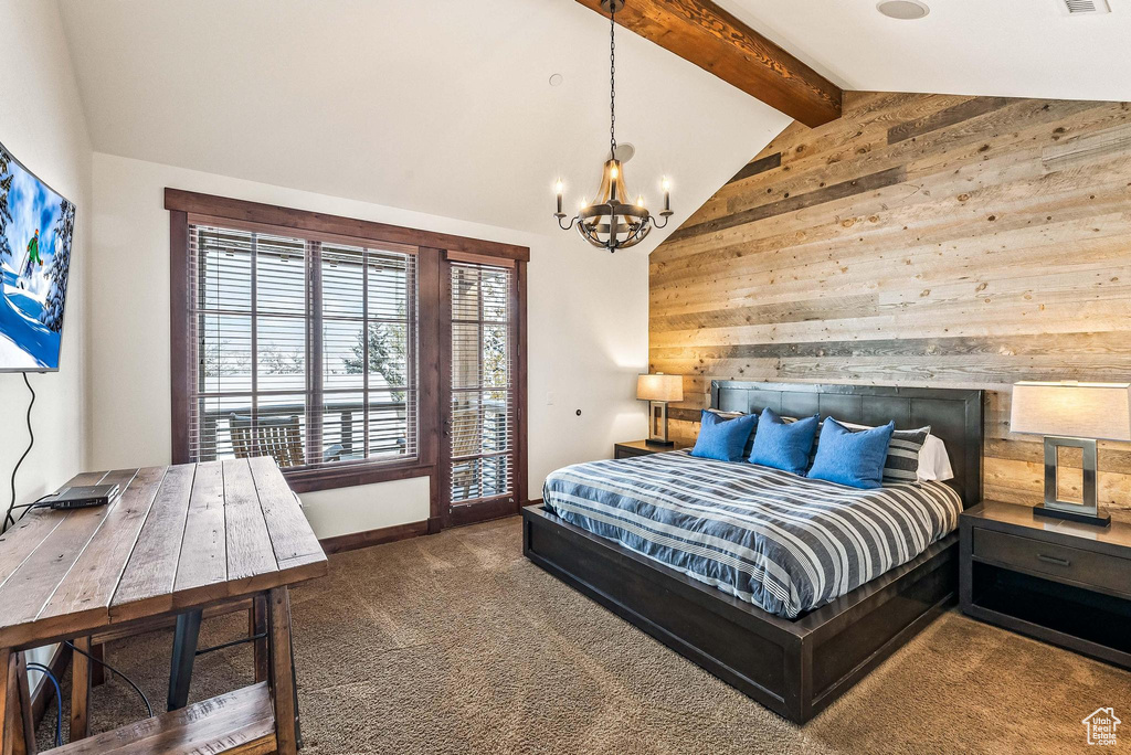 Bedroom with a notable chandelier, high vaulted ceiling, dark colored carpet, wood walls, and beam ceiling