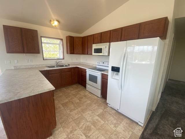 Kitchen with sink, white appliances, lofted ceiling, and light tile floors