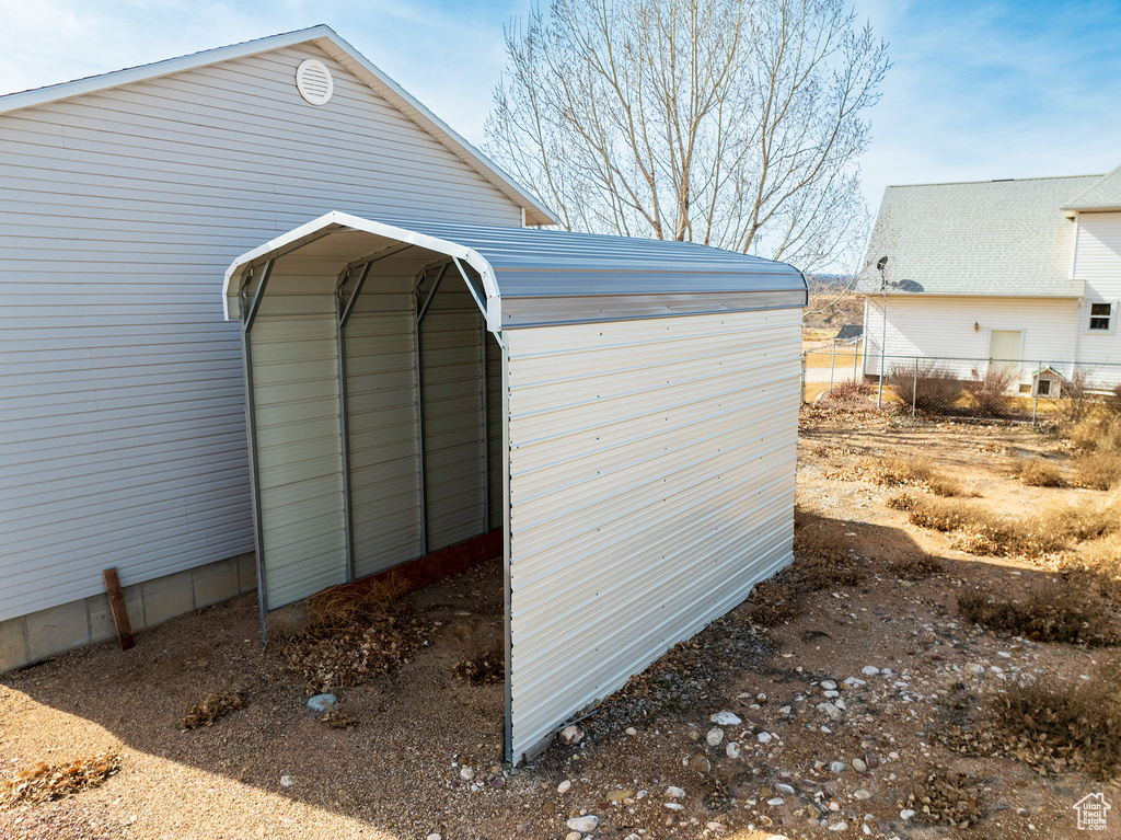 View of shed / structure featuring a carport