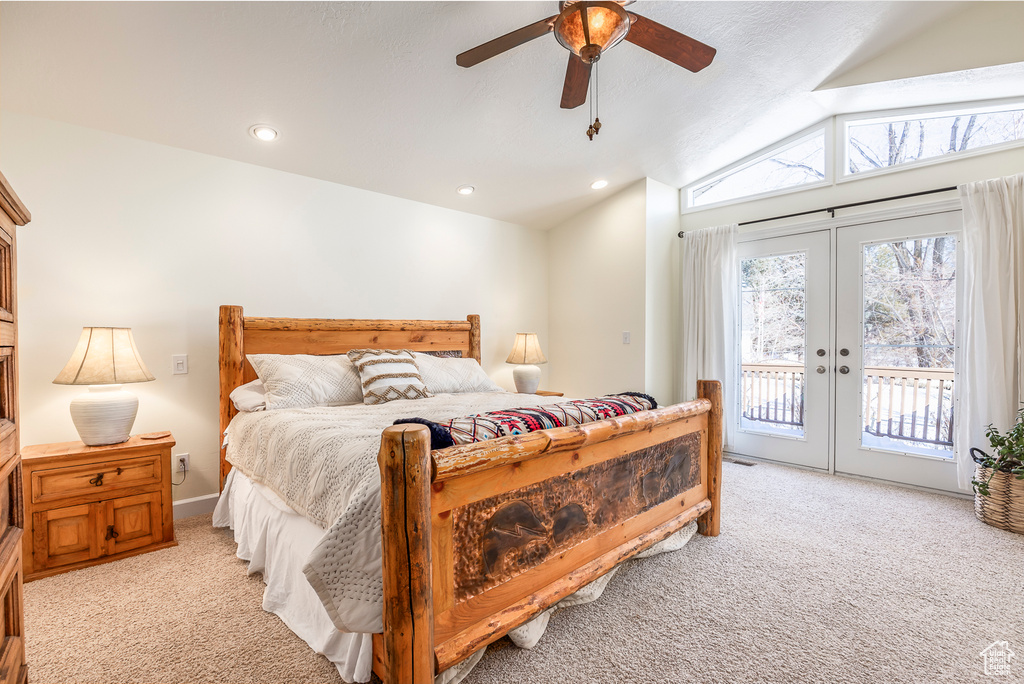 Carpeted bedroom with access to exterior, french doors, ceiling fan, and lofted ceiling