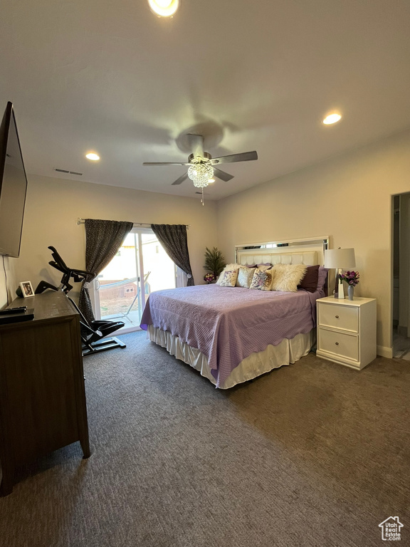 Carpeted bedroom with access to outside and ceiling fan