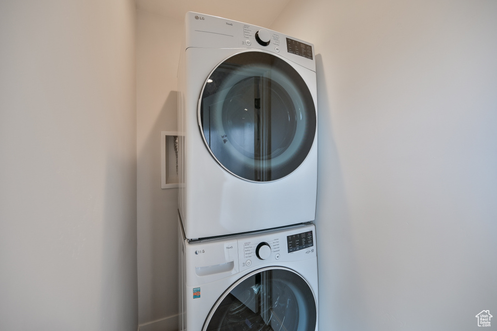 Laundry room with stacked washer / drying machine