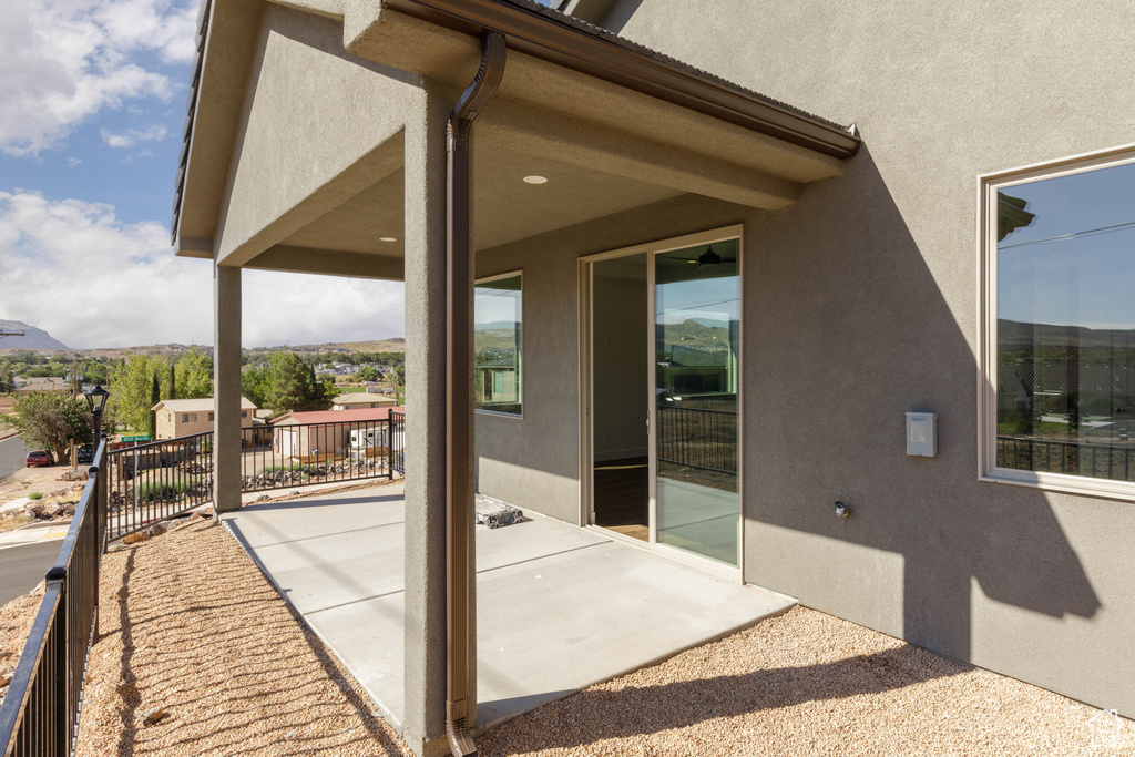 View of patio / terrace with a mountain view