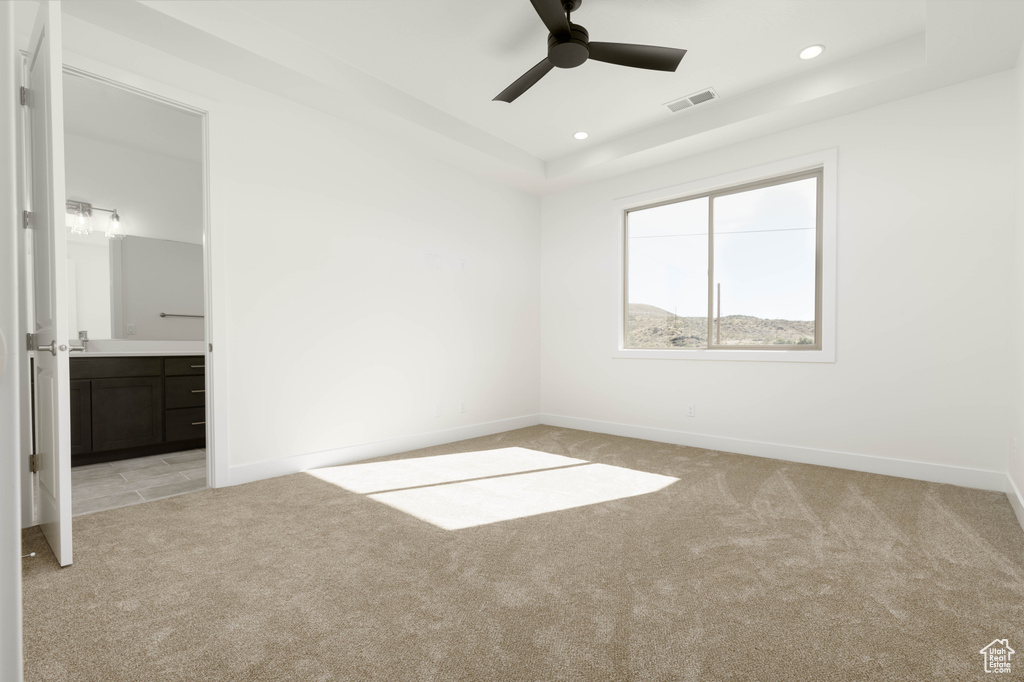 Unfurnished room with light carpet and ceiling fan