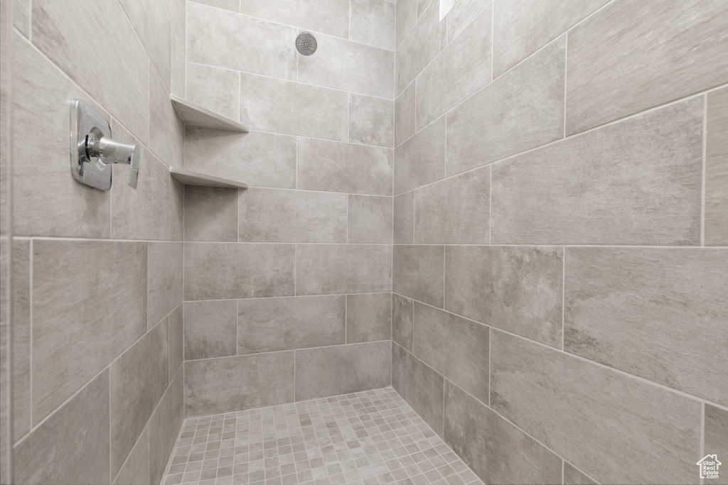 Bathroom with tiled shower