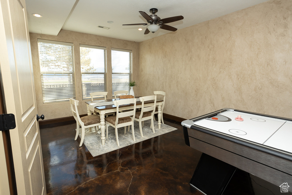 Dining room featuring ceiling fan