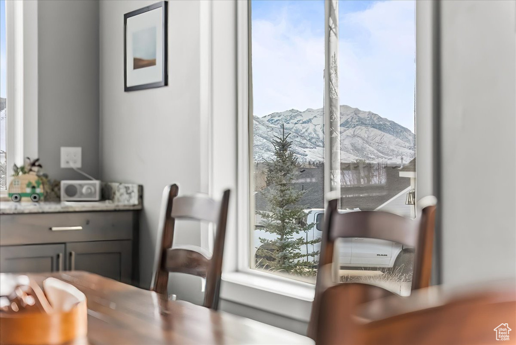 Dining space featuring a mountain view