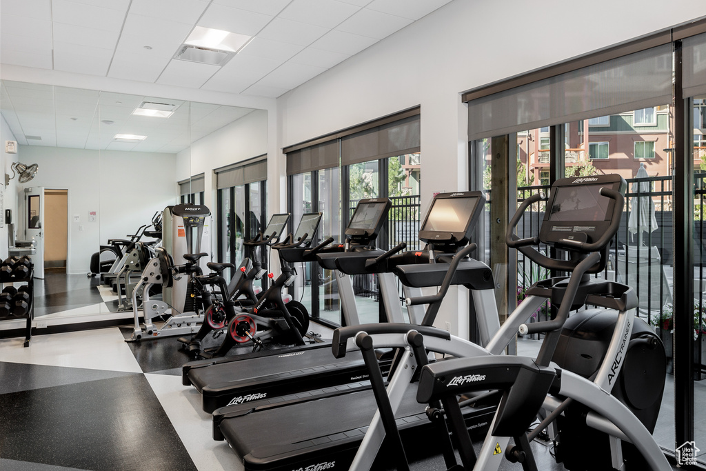 Workout area featuring a paneled ceiling