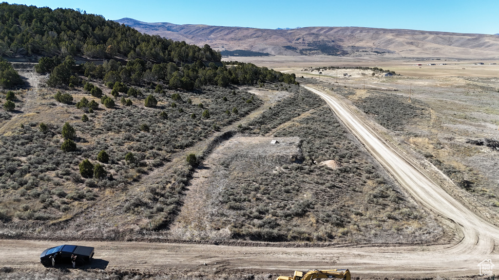 Birds eye view of property featuring a mountain view