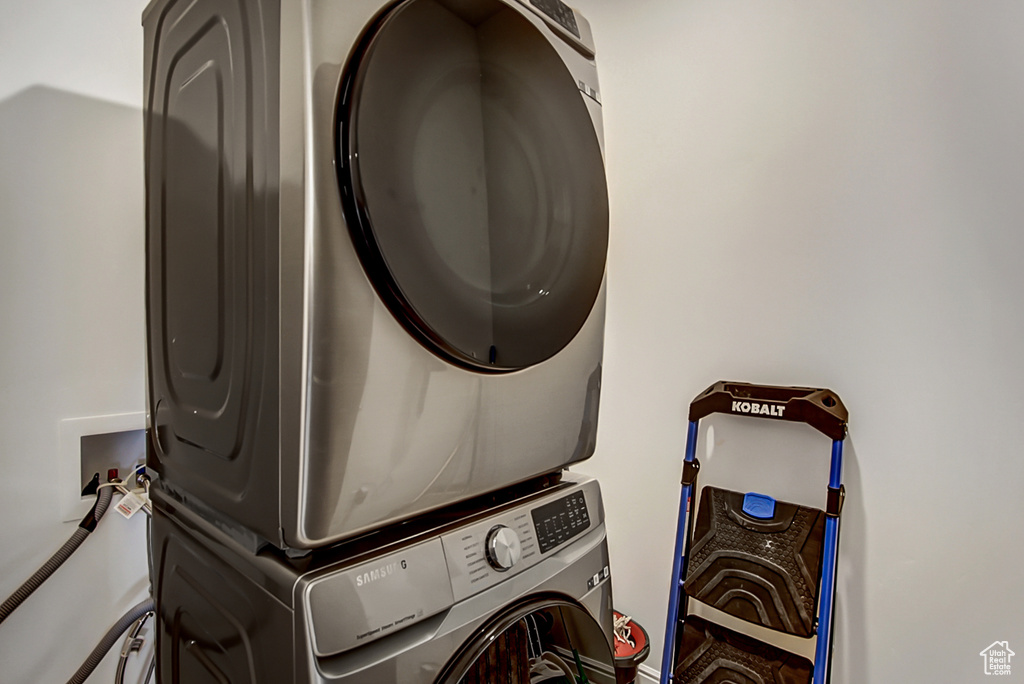 Laundry area featuring hookup for a washing machine and stacked washer / drying machine
