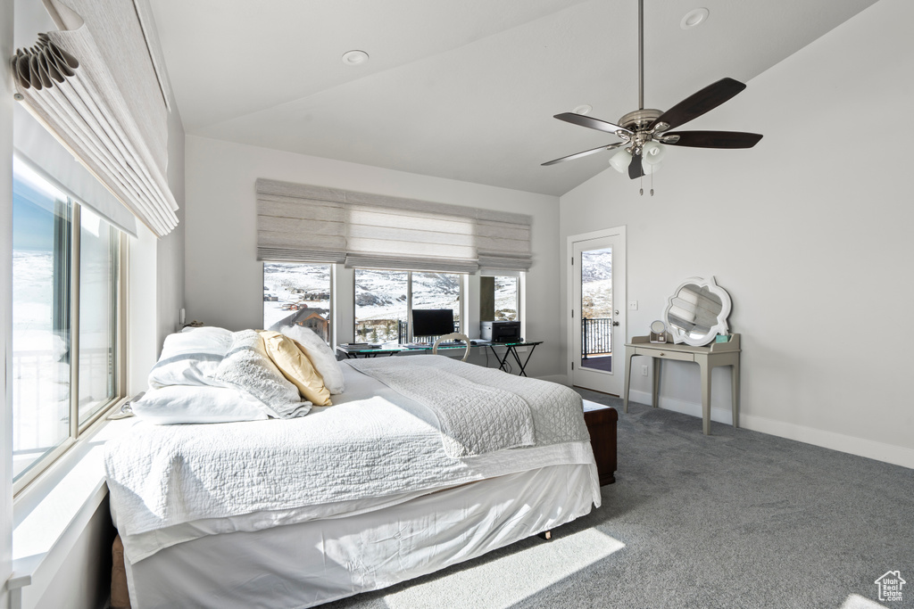 Carpeted bedroom featuring access to exterior, ceiling fan, and high vaulted ceiling