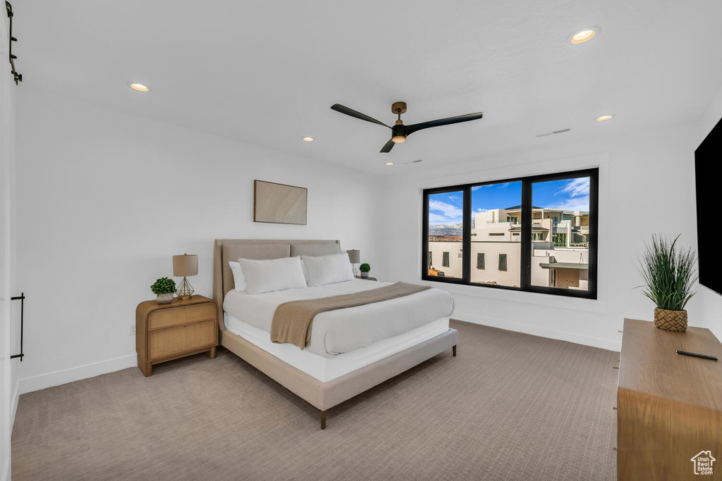 Bedroom with carpet floors and ceiling fan