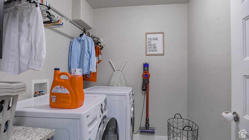 Laundry room featuring washer hookup and independent washer and dryer
