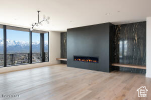 Unfurnished living room with wood-type flooring