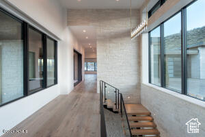 Hallway with wood-type flooring