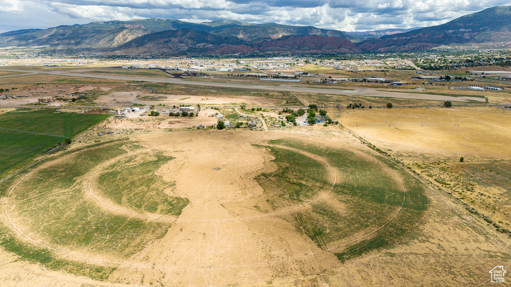 Property view of mountains with a rural view