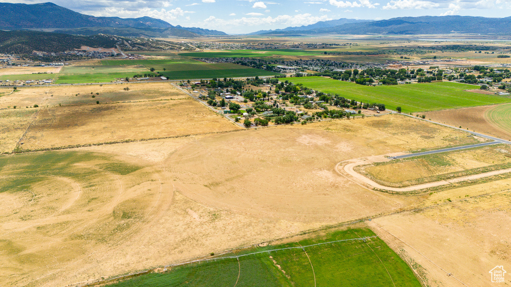 Aerial view featuring a rural view and a mountain view