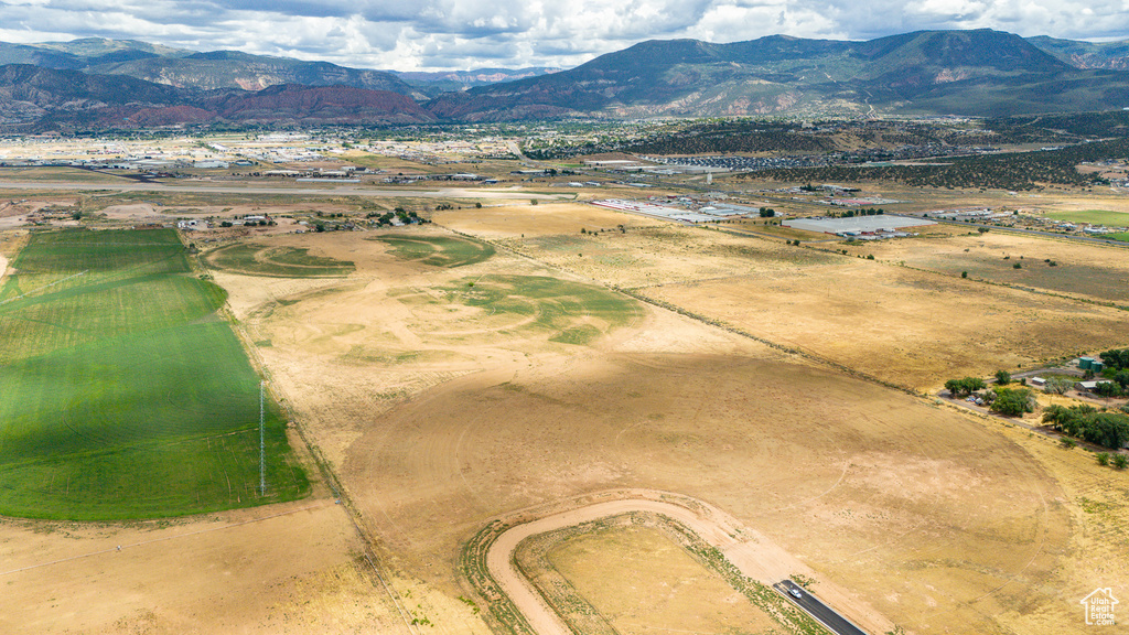 Drone / aerial view with a mountain view and a rural view