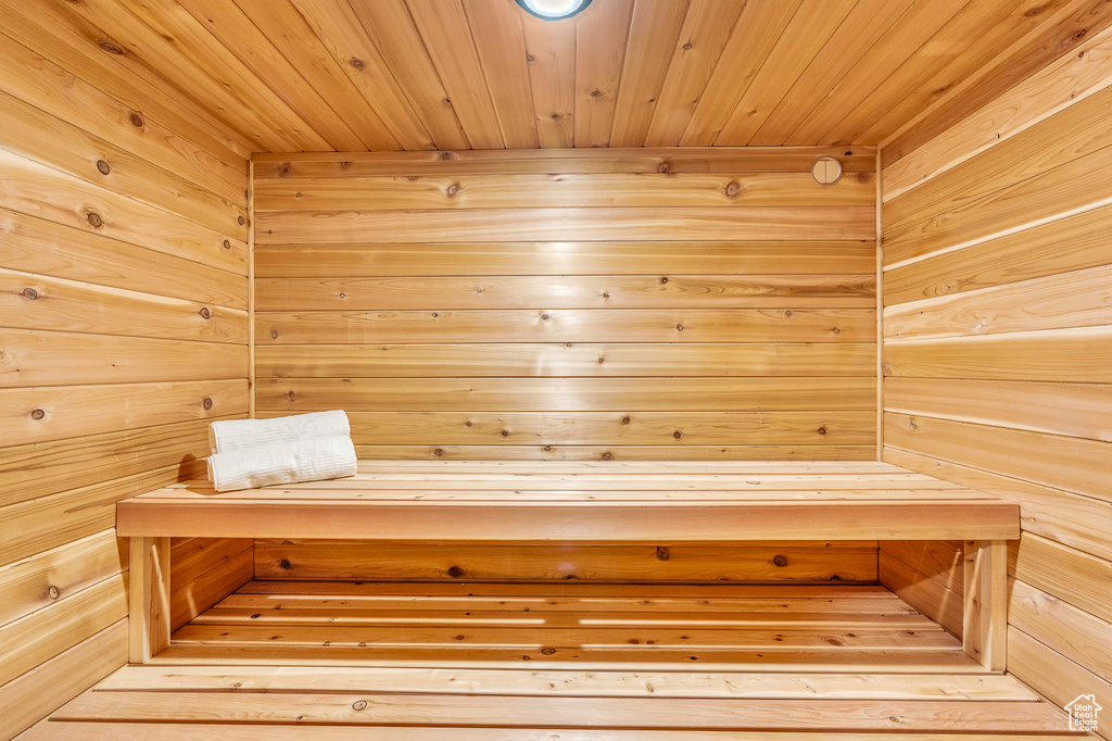 View of sauna / steam room with wood ceiling