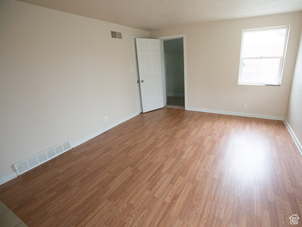 Unfurnished room featuring light hardwood / wood-style floors