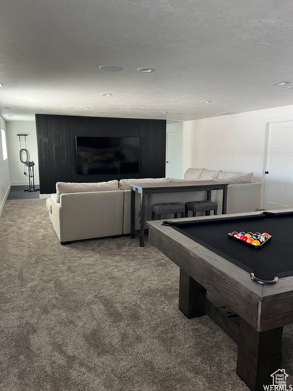 Recreation room with carpet and billiards