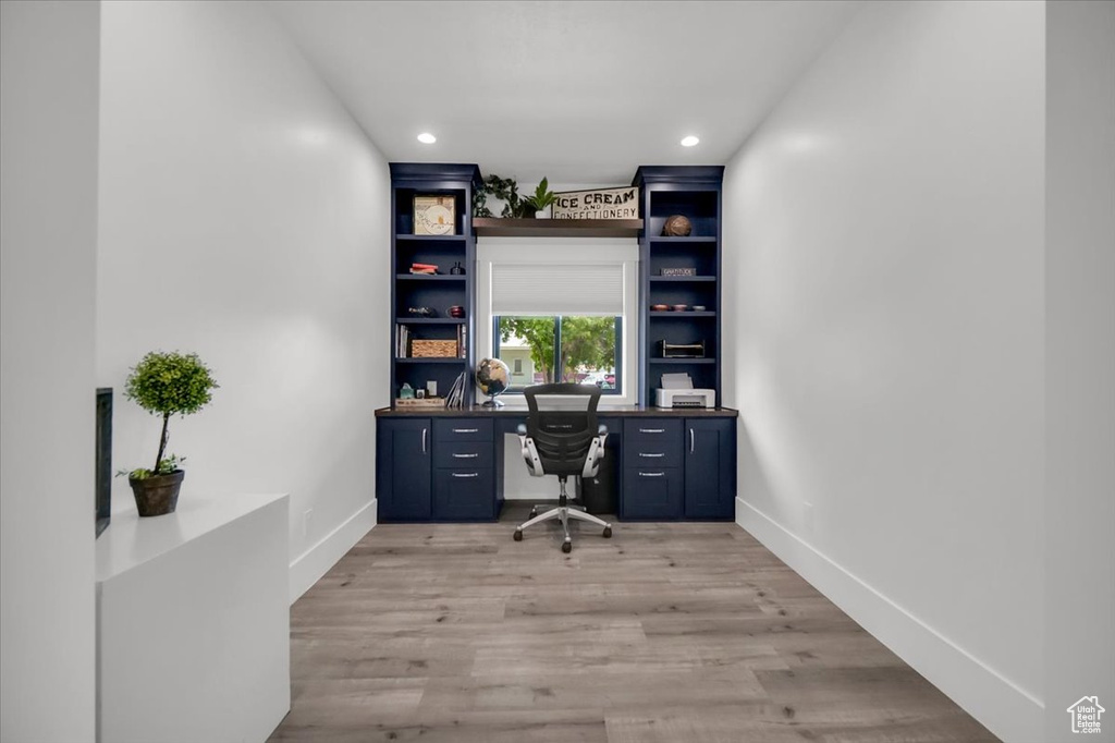 Home office featuring light wood-type flooring