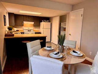 Dining room with hardwood / wood-style floors