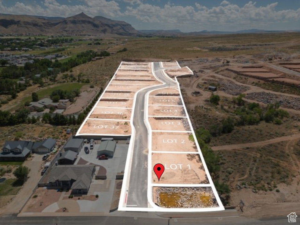 Drone / aerial view featuring a mountain view