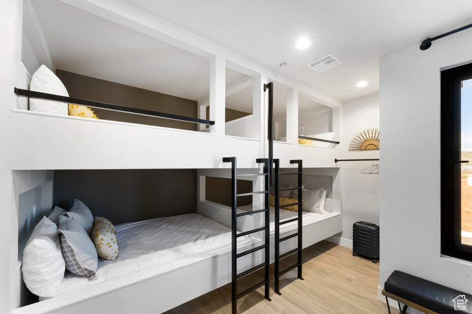 Bedroom featuring light wood-type flooring