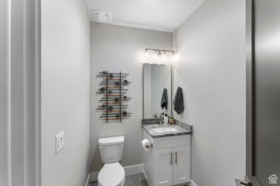 Bathroom with vanity and toilet